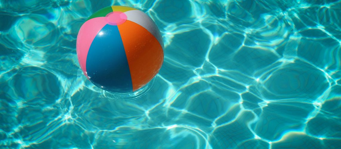 Our three tips to stay healthy this summer for sure include jumping in this inviting pool with that colorful beach ball waiting to be tossed around.